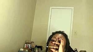 Ebony MILF masturbates with dildo and smokes